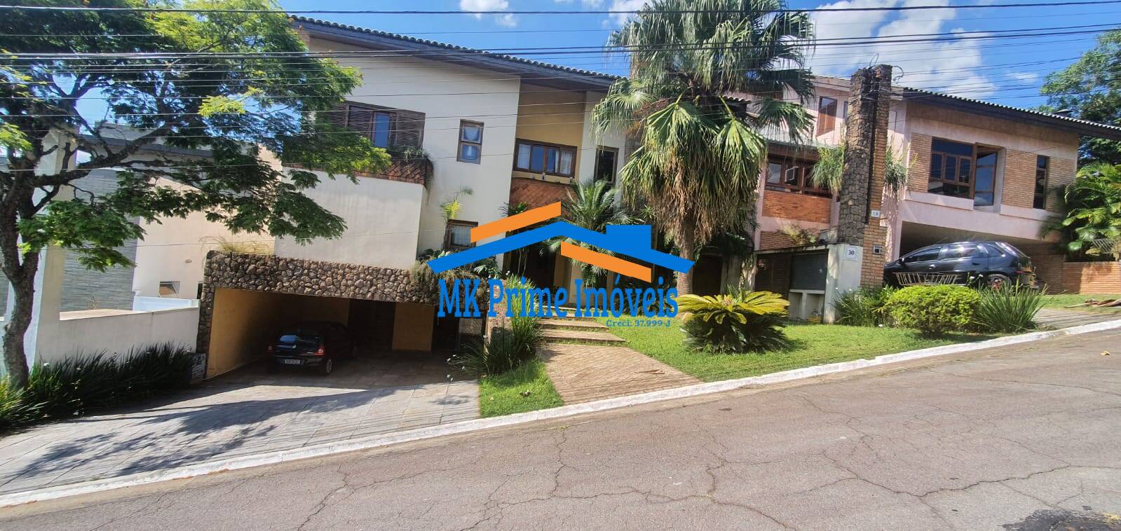 Casa de Condomínio à venda com 4 quartos, 450m² - Foto 1