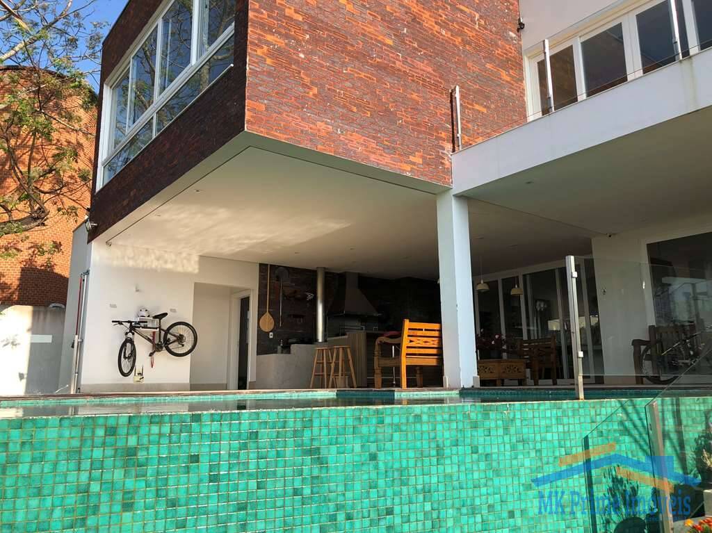 Casa de Condomínio para alugar com 4 quartos, 550m² - Foto 13